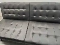 Luxurious convertible black faux leather futon