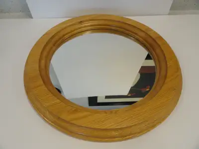 Circular Oak Mirror - 16" in diameter; oak honey in color; very good to excellent condition Made and...