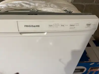 White Frigidaire dishwasher. Works perfectly.