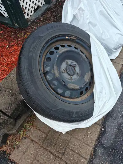 Set of 4 steel rims (17”) mounted with 225/60R17 all-season tires. Tires are worn but still hold air...