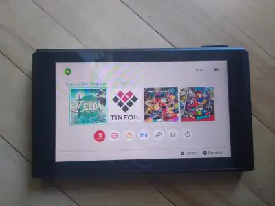 Console Nintendo Switch unpatcher. Ce qui veut dire que vous pouvez mettret tout les jeux que vous v...