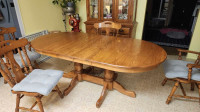 Oak dining room table and hutch