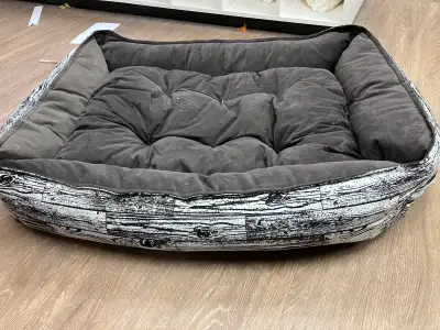 This cozy, plush dog bed measures 48 inches by 36 inches and provides a comfortable retreat for your...
