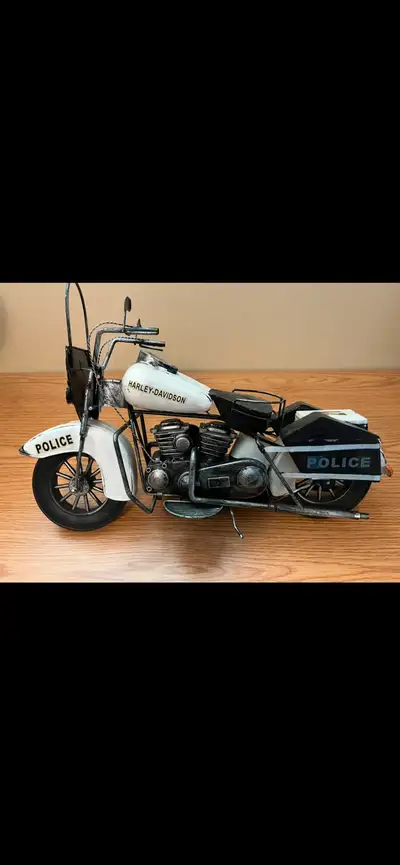 For sale like new pet and smoke free. Harley Davidson model bike. Nice gift for a man cave asking 40...