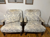 Two white accent chairs 