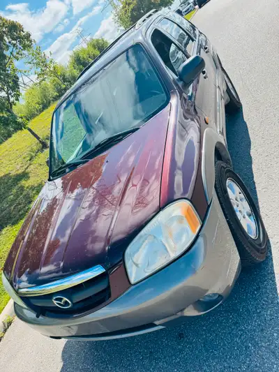 Selling my 2002 Mazda Tribute AWD sport Starting and running great , Ac cold heats works power windo...