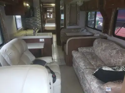 2000 motorhome it's licensed and insured at the moment she is like new wonderful shape ready to go a...