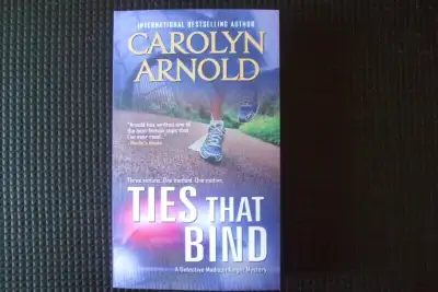 Ties That Bind by Carolyn Arnold, View more
