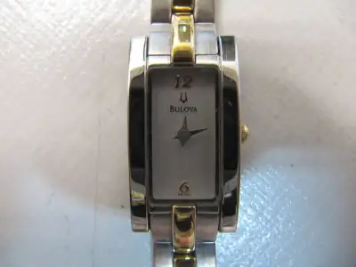 Classic Bulova Ladies Two Tone Gold Evening Watch Model C665091, View more