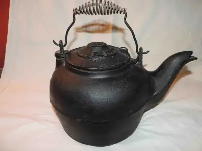VINTAGE CAST IRON KETTLE, View more