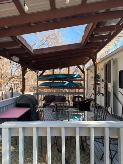 2011 dutchman, 2009 Malibu Boat, gas golf cart, two Pelican Kayaks, 10 x 20 deck with a lean too. Al...