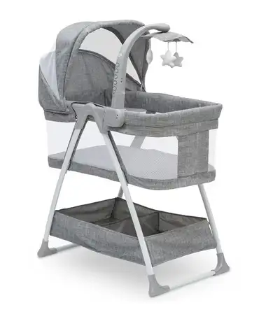 Delta Children Ultralight City Sleeper Bassinet, Grey Tweed With a cool, contemporary style enhanced...