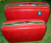 A pair of Vintage Samsonite luggage.