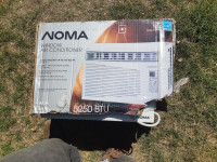 Noma air conditioner new in box. Window style