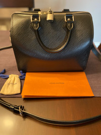 Authentic Louis Vuitton Speedy bag. 