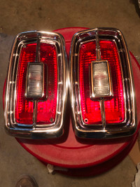 1966 Fairlane NOS taillight bezels and lenses . Real Ford parts