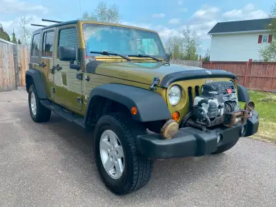 Lots of miles, but still runs. Doors, tailgate, roof, windows, etc all work. E-brake, not so much. F...