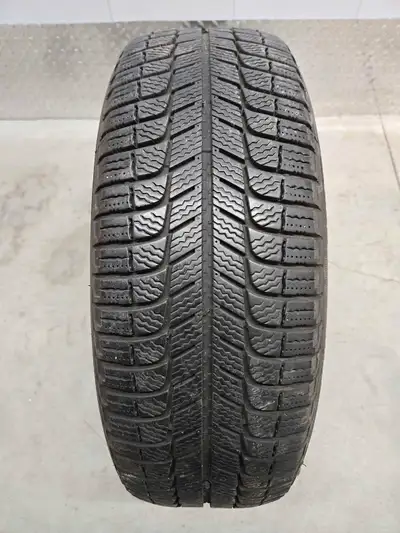 One Michelin X-Ice winter tire. 215/65R16 perfect single replacement or spare if you need one, save...