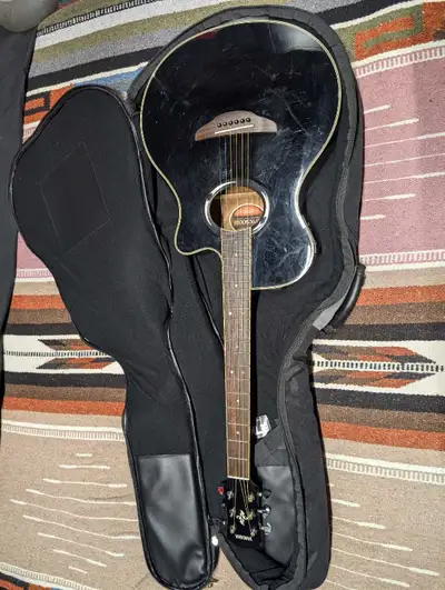 Up for sale is a really nice Yamaha thin line acoustic *Most of the issues in the photos are reflect...