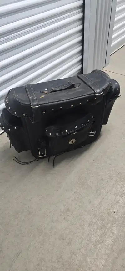 Leather bag attachments One for rear back bar tons of storage no tares, all in good condition. Other...