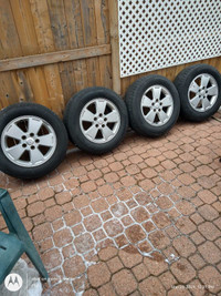 225 60 R16 Impala OEM rims with Pirelli all season tires.: