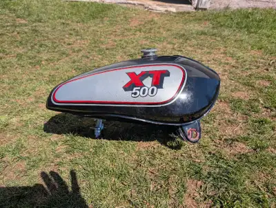 1977 XT 500 fuel tank. It's a reproduction from eBay comes fuel cap and petcock. Can ship at buyers...