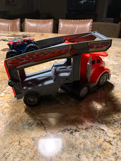 Mint condition. It can hold larger vehicles and monster trucks. Smoke free home. Monster truck not i...