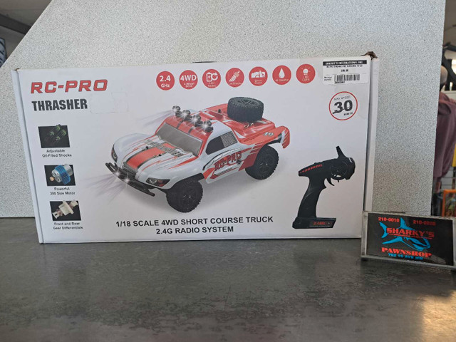 RC Pro Thasher 4WD W/Accessories (26563961) in General Electronics in Calgary
