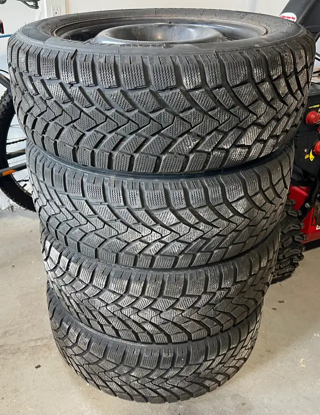 VW Passat 4 Winter tires on Steel rims. 215/55/R16 in Tires & Rims in Markham / York Region - Image 2