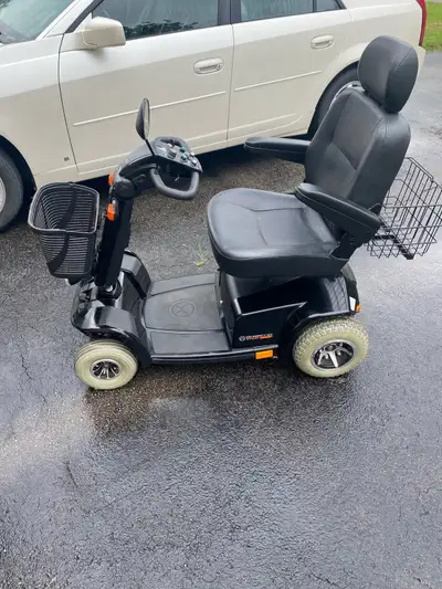 Four wheel model in excellent condition! Has front and rear baskets and included charger! Will deliv...