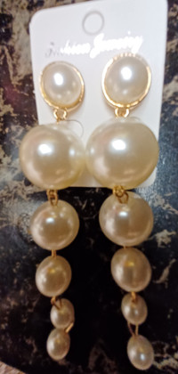 Pearl earrings and butterfly earrings