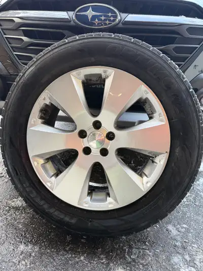 Four OEM Subaru 17” tire rims with Hankook Optimo H727 summer tires installed. P225/60R17.