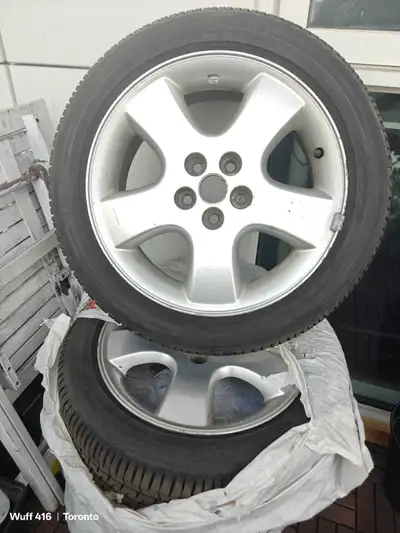 4 All season Tires with Rims. Firestone 195/50 R16 Rim: 5 by 100 Dot 17/21 Nearly new tread - in exc...