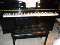 Yamaha piano  model #  E 108