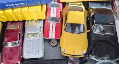 I have a several toy cars for sale, form left to right: Aston Martin DBS chevy camaro ss, 1967 chevy...