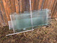 Glass shower doors from a corner soaker tub 