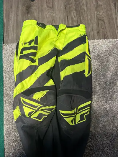 Two pairs of size 11 Thor boots. Thor chest protector Fly pants size 32 Fox jersey size medium All f...
