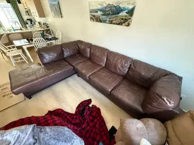 spacious brown leather sectional, View more