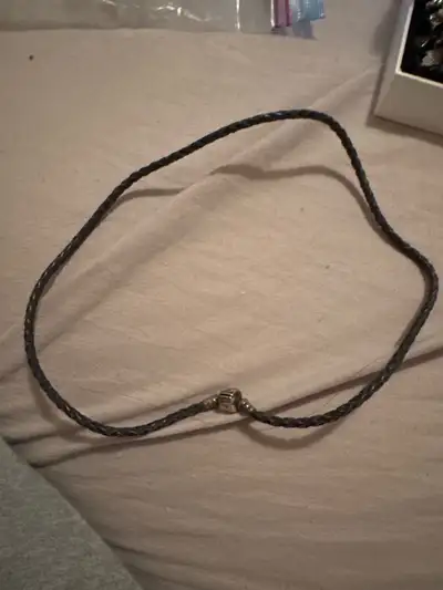 This is a used Pandora braided black leather necklace that's approximately 17 inches long and ready...