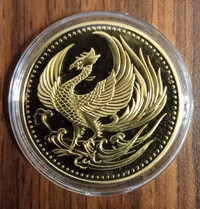 Gold style coin with phoenix on front and Chrysanthemum on back