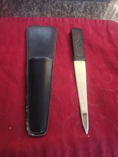 Gold letter opener with leather case, View more