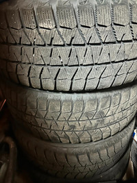 Bridgestone Blizzak winter tires on rims