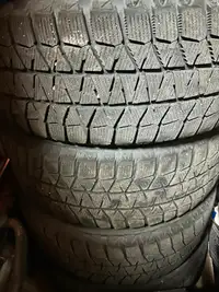 Bridgestone Blizzak winter tires on rims
