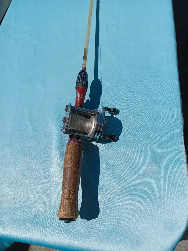 Vintage Shakespeare fishing reel and rod63694086919299122