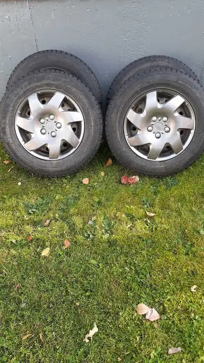 Winter tires for sale with rims and covers . 215-70R16 Perfect condition. $550 obo. Phone: (902) 919...