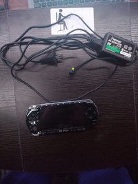PSP 3000 with 12 games includes games holder, system carrier