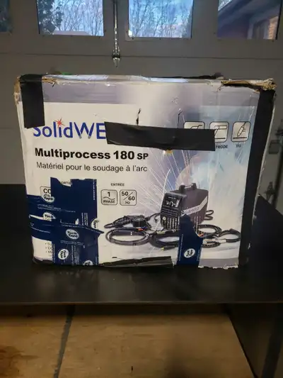 Solid weld multiprocess 180 SP 110v welder brand new in box never used. Included is a table, another...