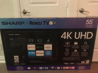55 “ Sharp Roku 4K UHD TV with multi angle wall mount. 