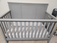 Baby crib and dresser