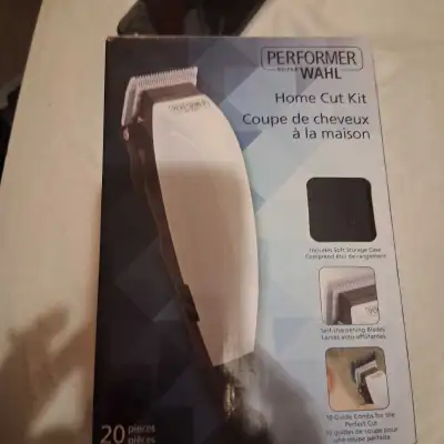 I'm selling a new Wahl Home Cut Kit, which includes a soft storage case, self-sharpening blades, and...